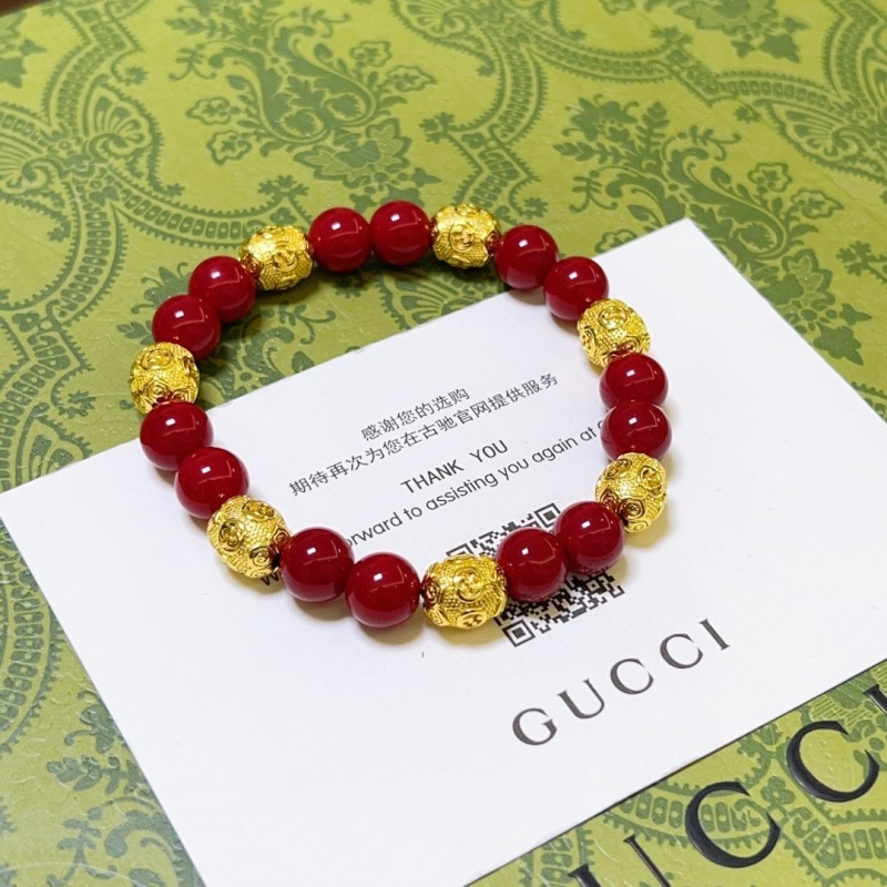 G*u*i bracelets